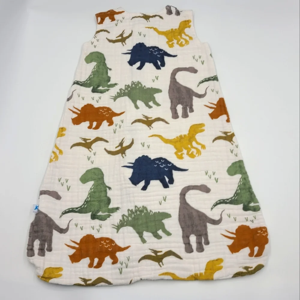 Little Unicorn Muslin sleep bag in dino friends